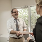 Dr. Strickland working with a coworker