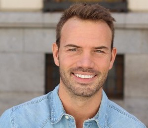 dental-implant-benefits Portrait of a smiling young man
