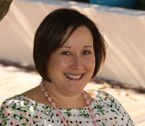 pam-portrait-min Pam's smiling portrait after dental treatment