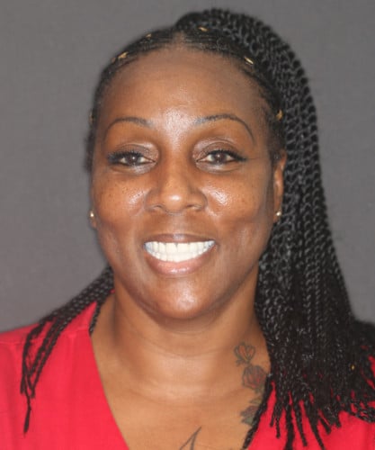 Renee's smiling portrait after dental treatment