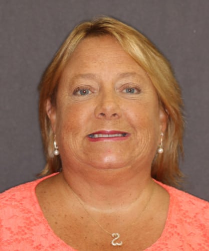 Patrice's smiling portrait after dental treatment