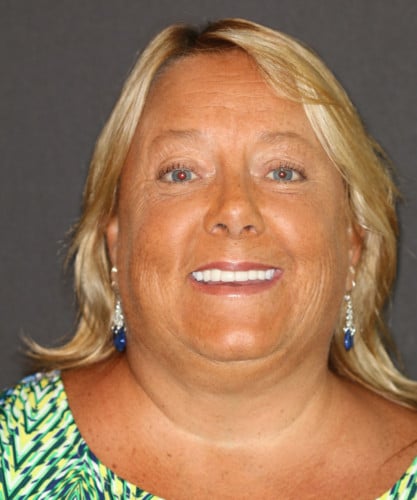 Patrice's smiling portrait after dental treatment