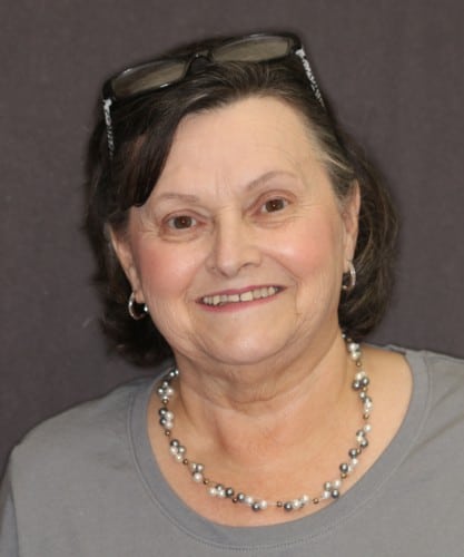 Jean's smiling portrait before dental treatment