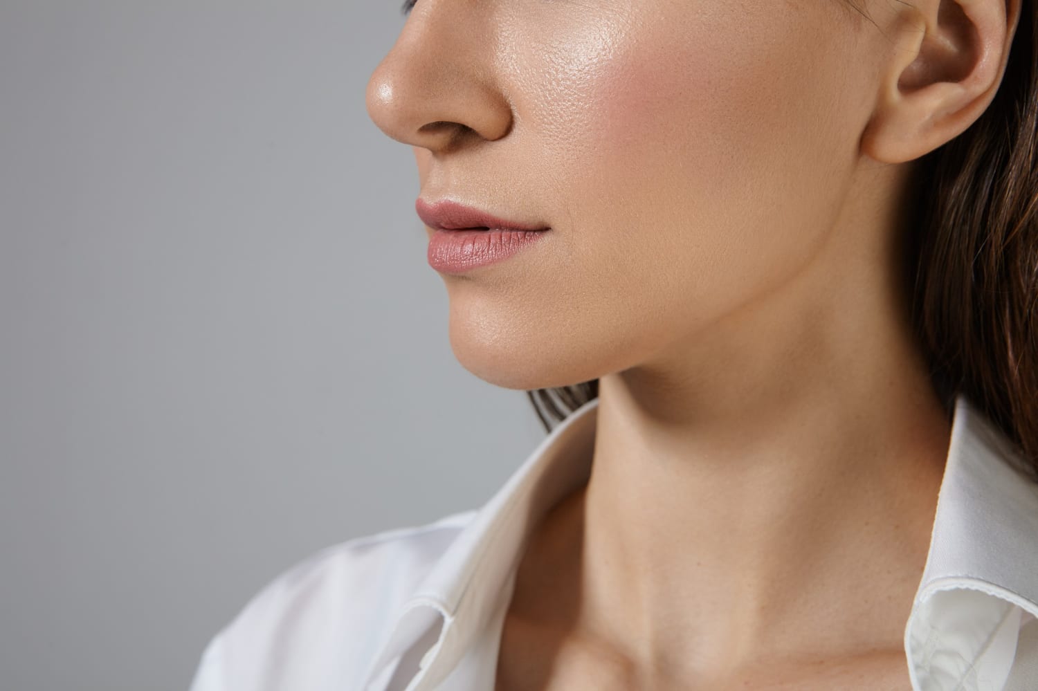 Close-up of a woman's face showing her smooth skin