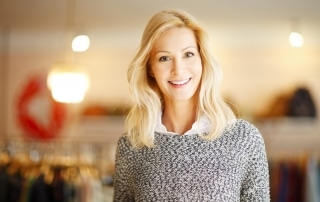 Woman smiling in a store
